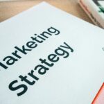 Close-up of a marketing strategy document on a desk, ideal for business content.